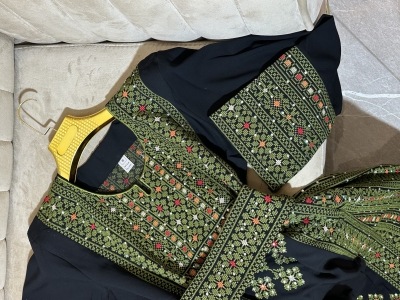 ثوب أصالة بالطرز الأخضز