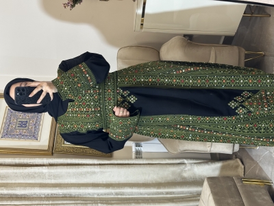 ثوب أصالة بالطرز الأخضز